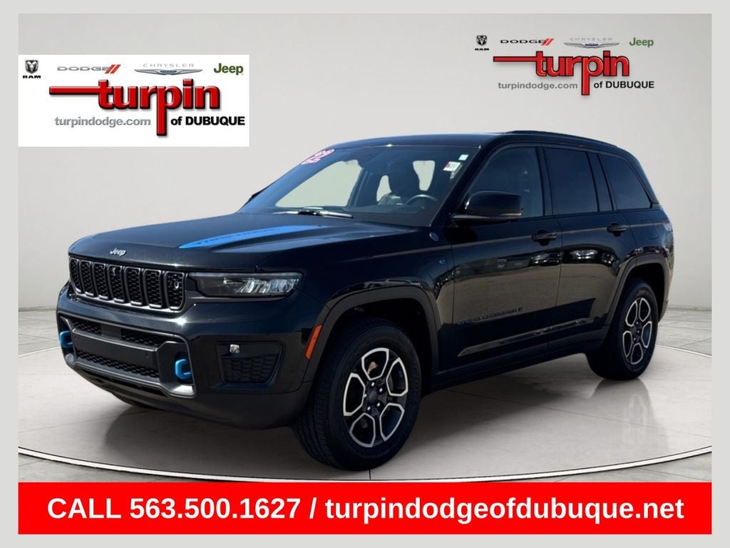 2022 Jeep Grand Cherokee Trailhawk 4xe in Diamond Black Crystal Pearlcoat — front three-quarter view