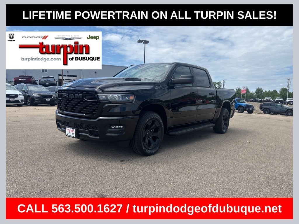 2026 RAM 1500 Express in Diamond Black Crystal Pearlcoat — front three-quarter view