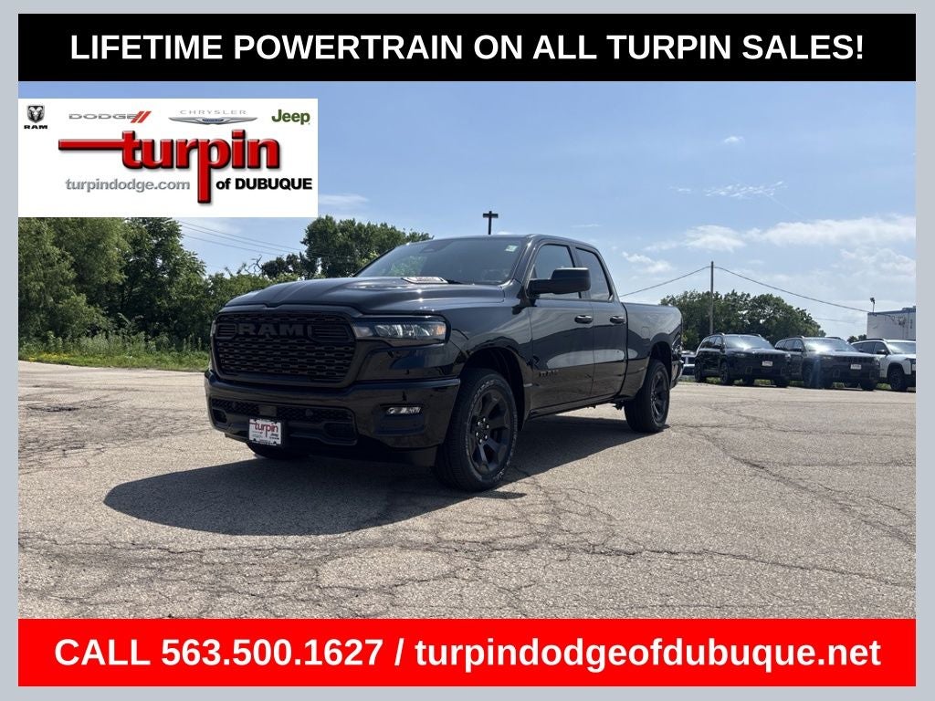 2026 RAM 1500 Express in Diamond Black Crystal Pearlcoat — front three-quarter view