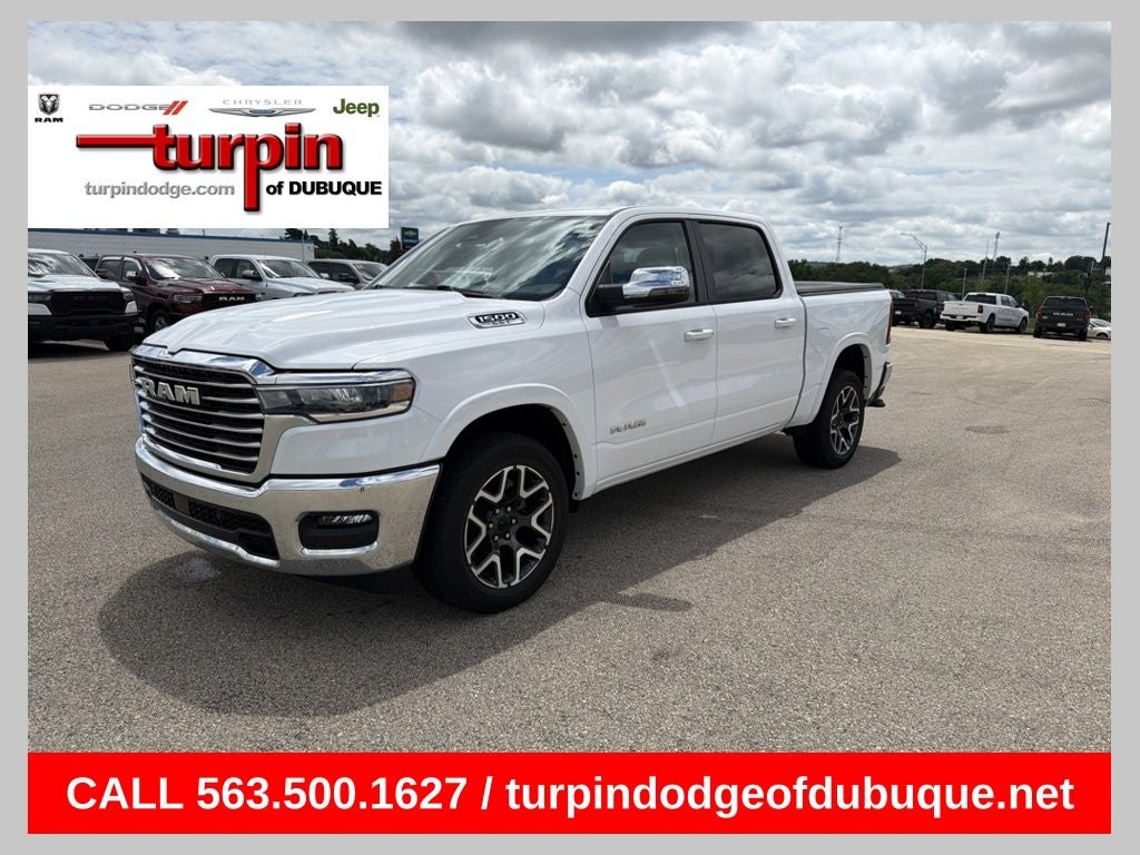 2025 RAM 1500 Laramie in Bright White Clearcoat — front three-quarter view