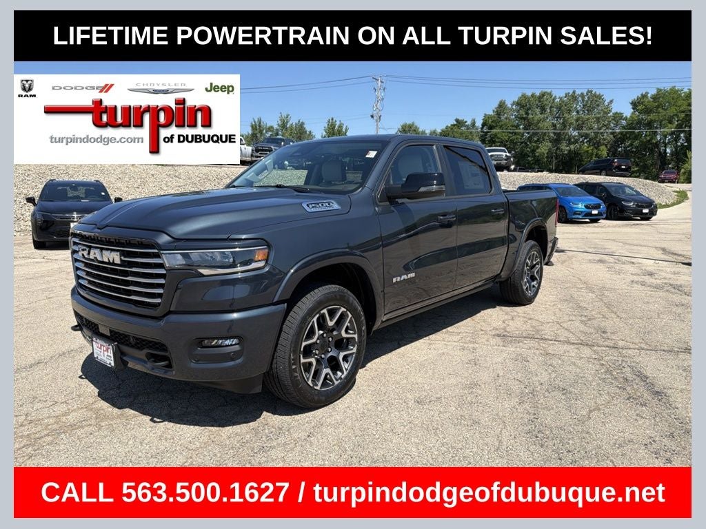 2026 RAM 1500 Laramie in Forged Blue Metallic — front three-quarter view