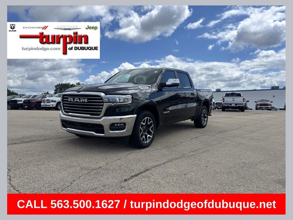 2025 RAM 1500 Laramie in Diamond Black Crystal Pearlcoat — front three-quarter view