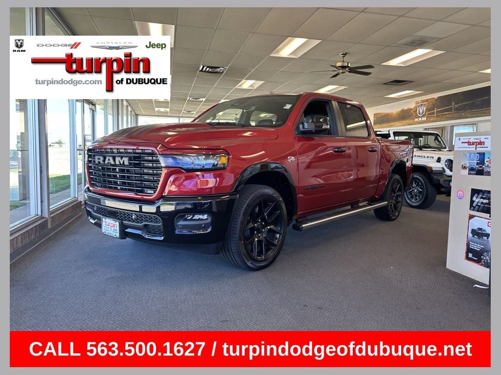 2026 RAM 1500 Laramie in Molten Red Pearlcoat — front three-quarter view