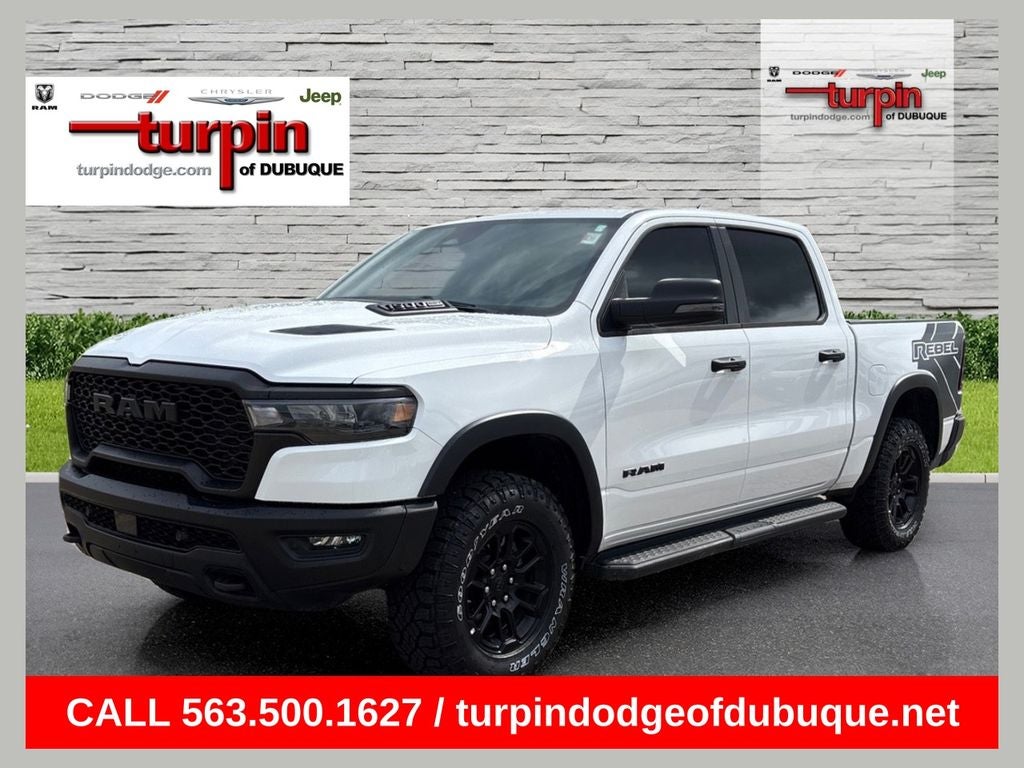 2025 RAM 1500 Rebel in Bright White Clearcoat — front three-quarter view