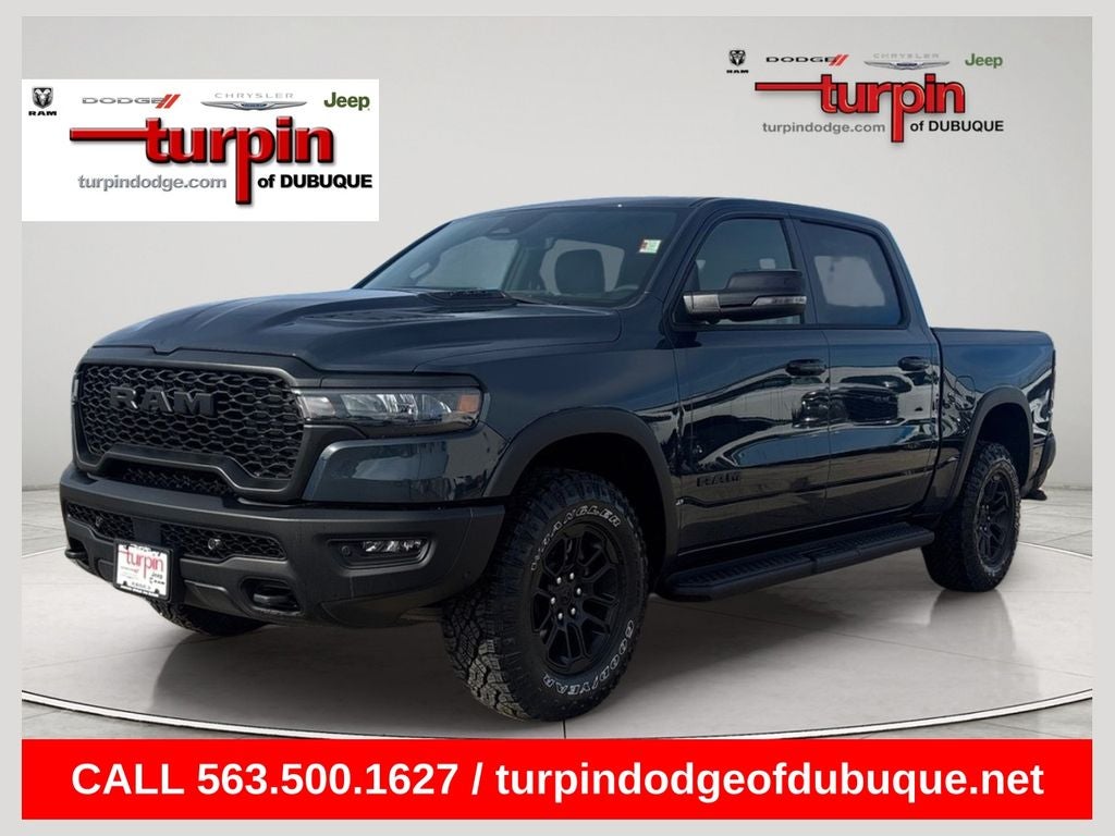 2026 RAM 1500 Rebel in Forged Blue Metallic — front three-quarter view