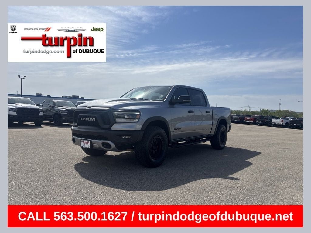 2024 RAM 1500 Rebel in Billet Silver Metallic Clearcoat — front three-quarter view