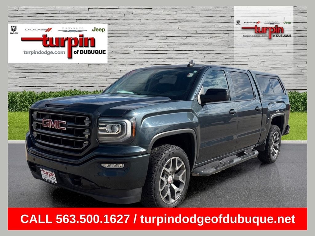 2017 GMC Sierra 1500 SLT in Dark Slate Metallic — front three-quarter view